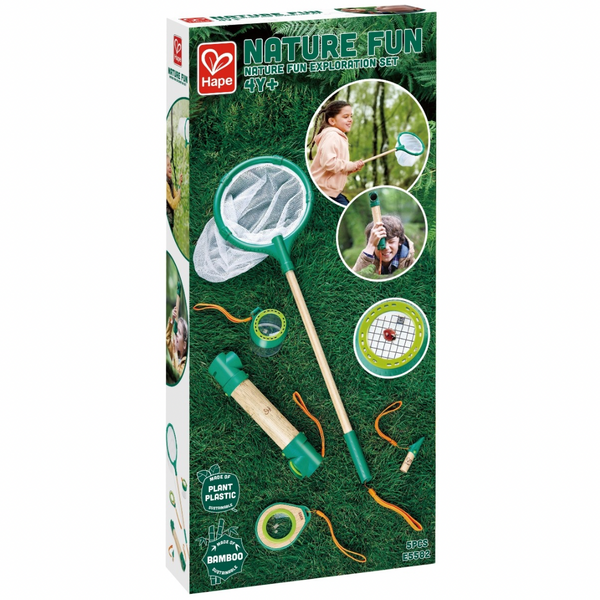 Hape 4 in 1 Nature Exploaration Set CHEZA PLUS, package view of a child using the compass from the set while walking in nature