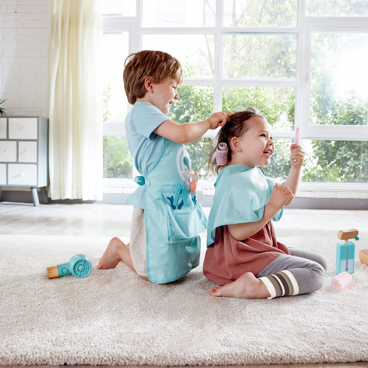 Hape Super Stylish Hair Salon Set CHEZA PLUS, kids having fun with the pretend play hair set available in Kenya