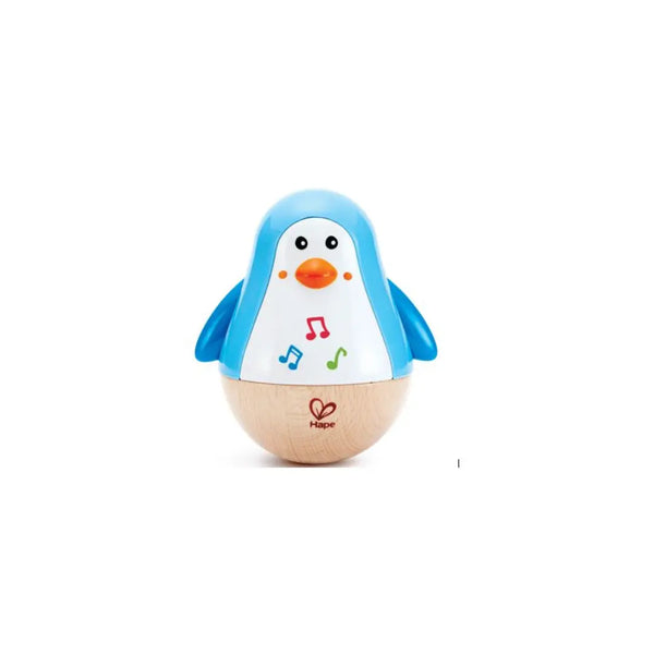 Hape Penguin Musical Wobbler – wooden baby toy available at Cheza Plus Kenya, with cute black-and-white penguin design and gentle musical sound.