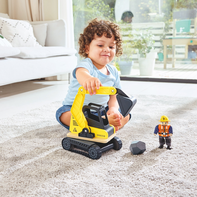 Child playing with Hape excavator set – realistic construction toy Kenya
