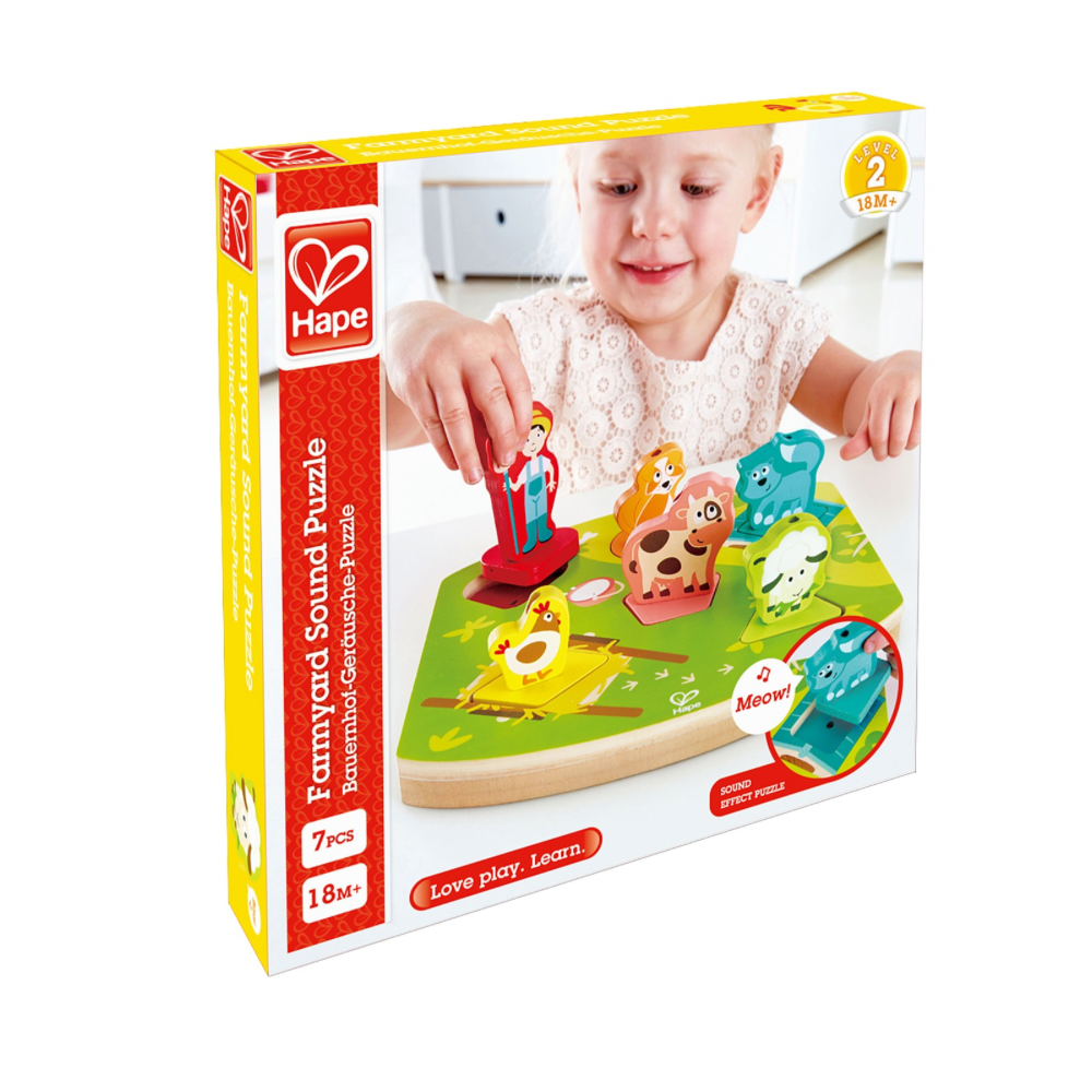 Hape family yard sound puzzle packaging with a child playing with the puzzle.