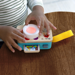 Baby using Baby Einstein Learning Lens by Hape – Sensory toy promoting curiosity and exploration