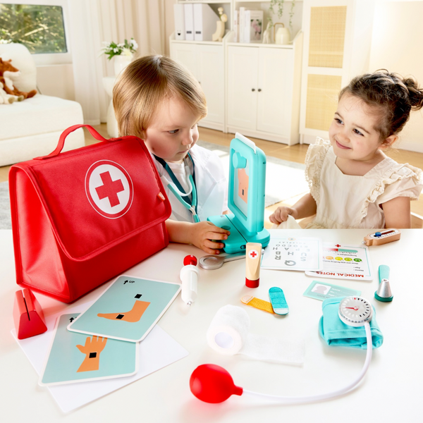 Child playing doctor with Hape medicat kit - realistic pretend play - Kenya
