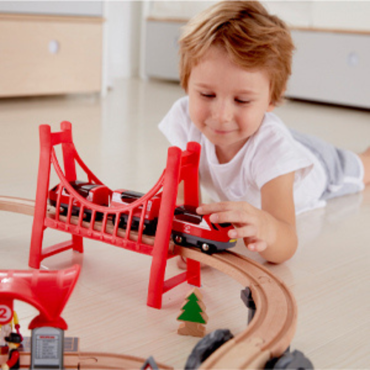 Close up of train set accessories buildings and vehicles