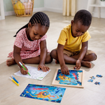 Children playing with Hape ocean puzzle educational toy in Nairobi