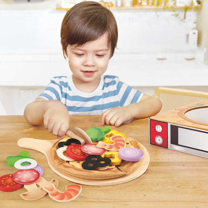 Children playing with pizza playset toy in Nairobi