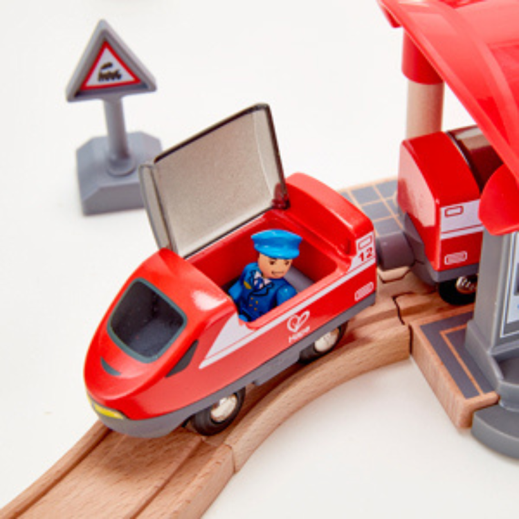 Educational train toy supporting fine motor and problem solving