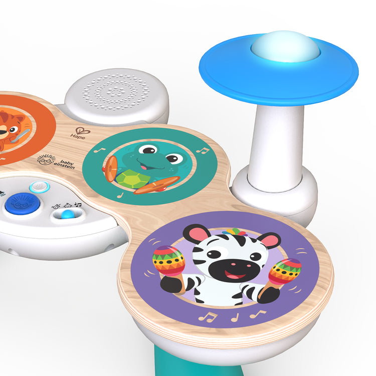 Close-up of electronic kids drum set with animal rhythm pads and light-up cymbal